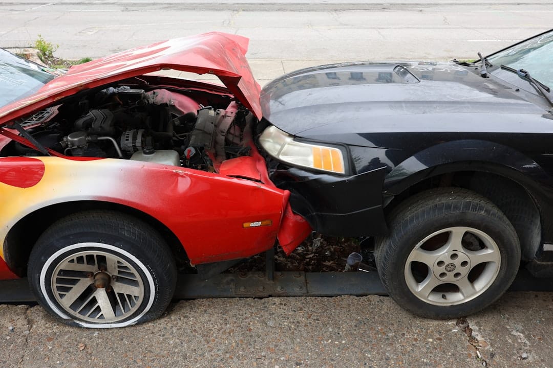Two cars involved in a frontal collision on the road