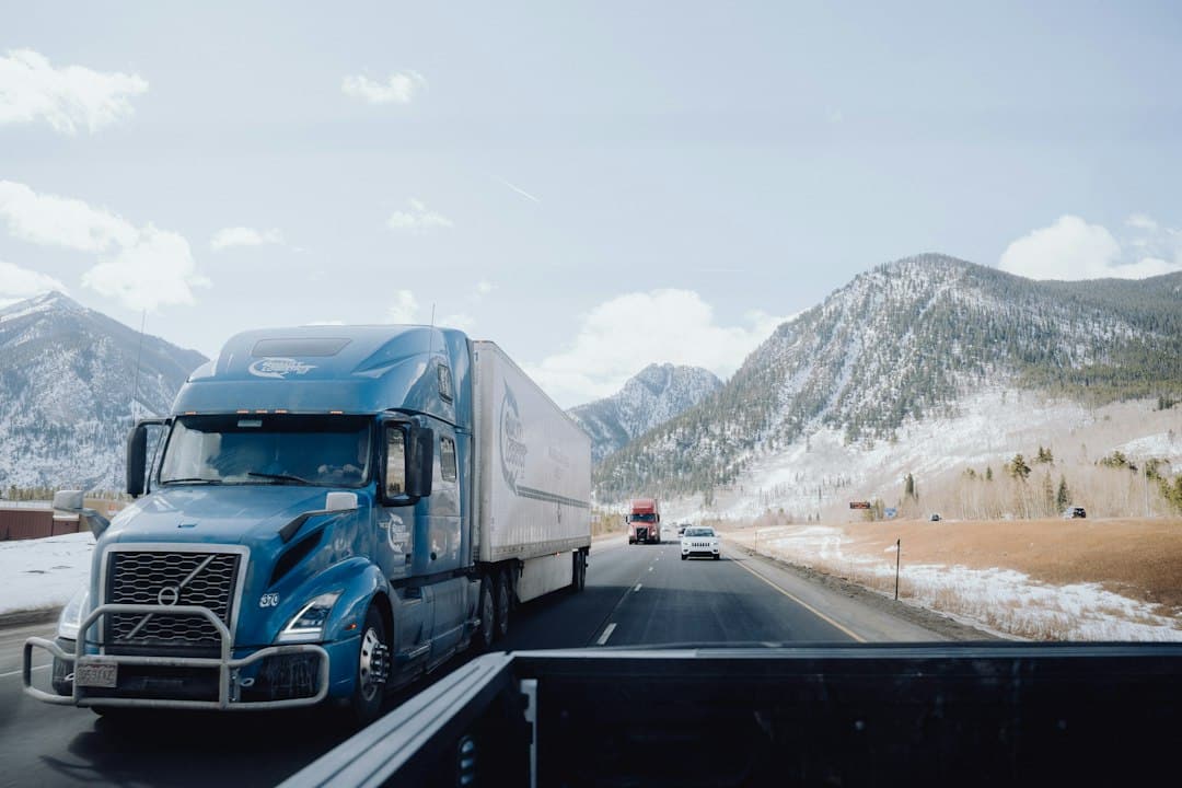 A semi truck driving on a highway