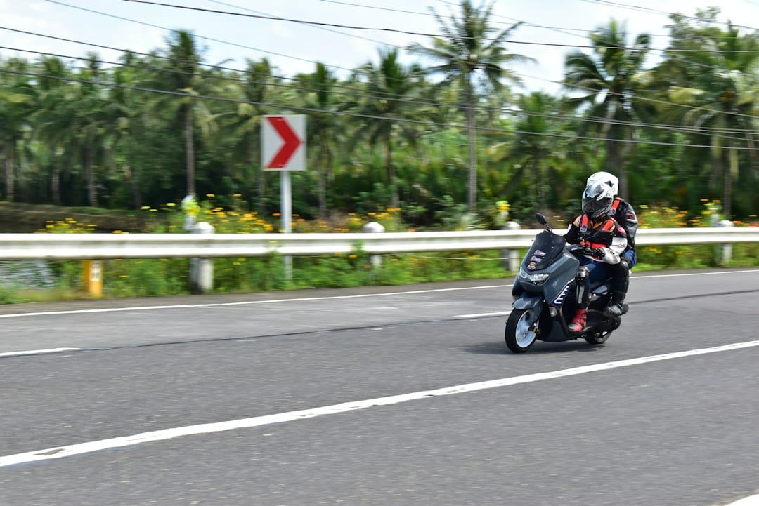 A motorcyclist riding on an open road
